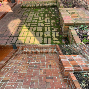 A before and after collage of a brick paver patio with algae and moss on top and then a clean patio on the bottom.